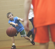 boy passing basketball